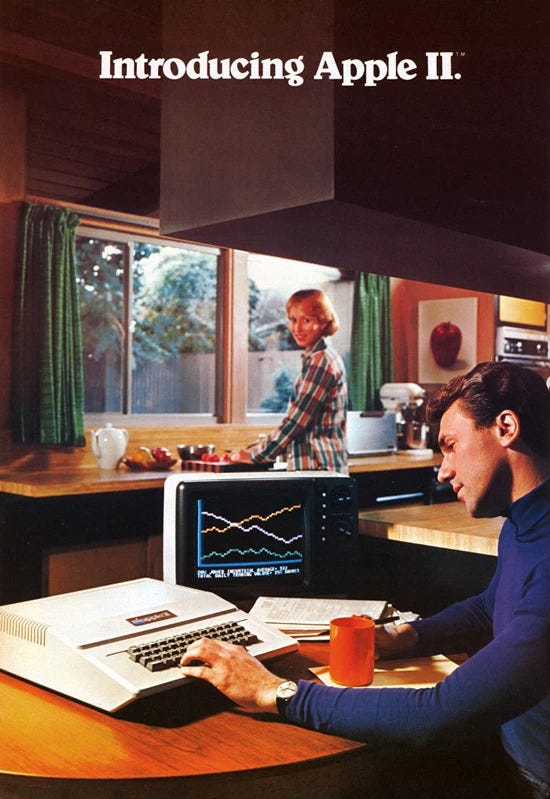 Some people from like 40 years ago playing with an Apple ][