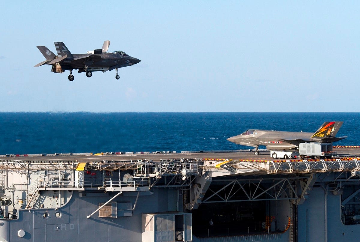 An F-35B Lightning II aircraft performs a vertical landing aboard the amphibious assault ship USS Wasp (LHD 1). Wasp is underway in support of F-35B Lightning II Developmental Testing phase II (DT-II). DT-II is a collaborative effort among the Navy, Marine Corps, and coalition partners to validate operational capabilities of the F-35B for amphibious platforms (LHD, LHA). (U.S. Navy photo by Lt. Michael J. Fallon/Released)