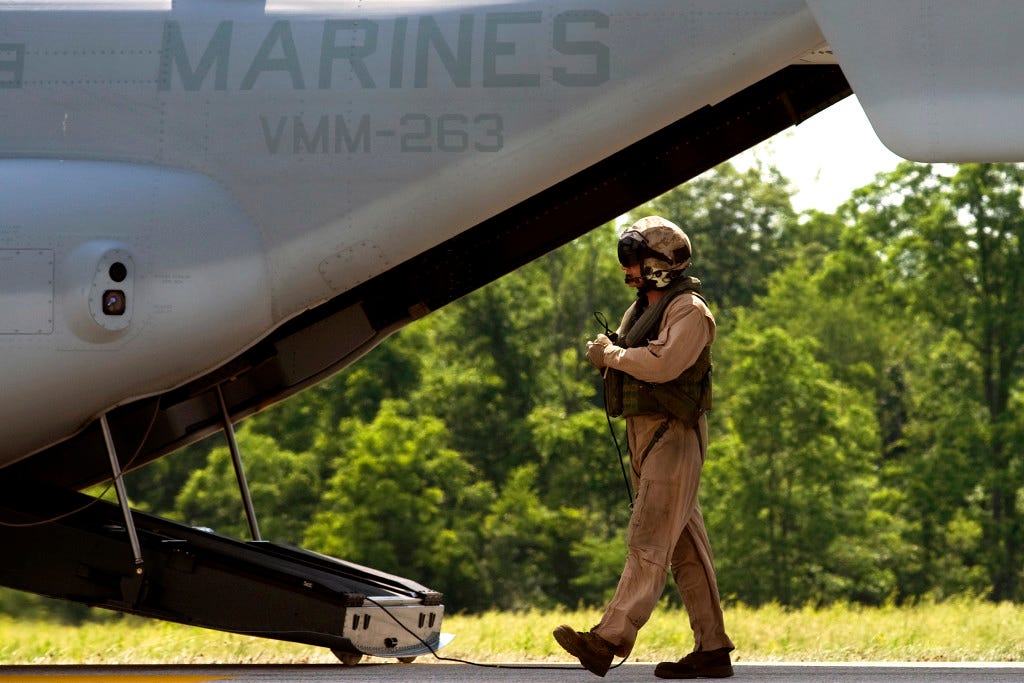 A U.S. Marine Corps crew chief inspects a V-22 in 2008. U.S. Army photo