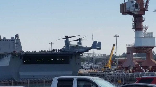 A V-22 dangling off the deck of USS New Orleans. Photo via Ian Keddie