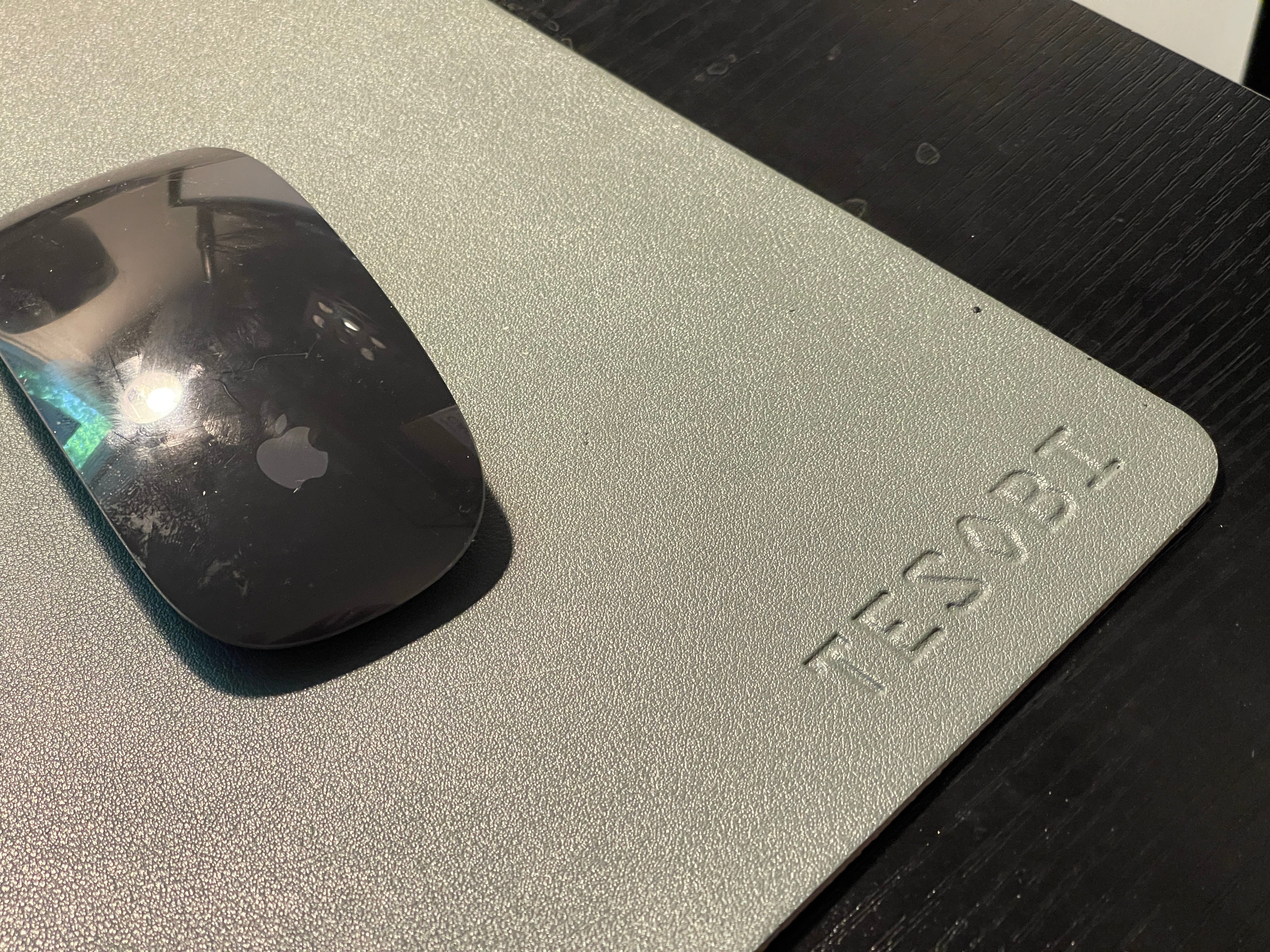 this is the corner of my gray leather "mouse pad" and it's just a nice little touch.