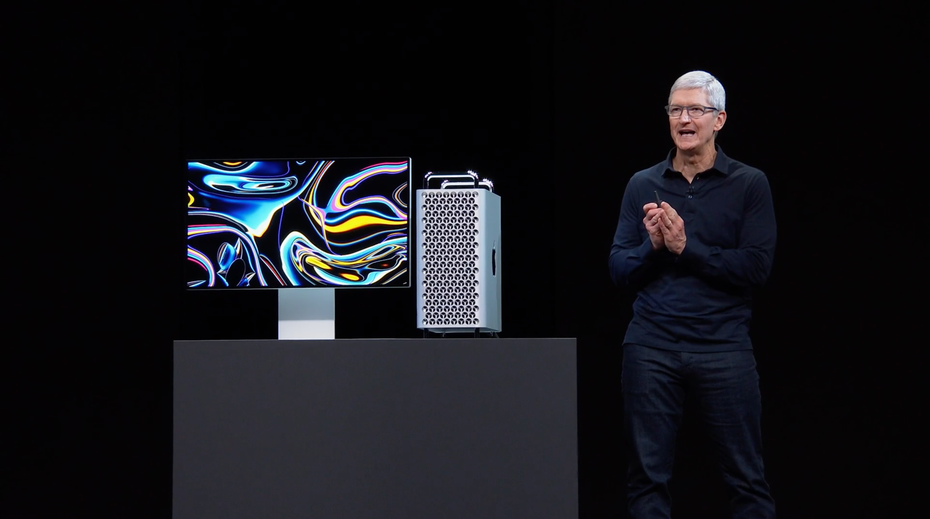 Tim Cook showing the new Mac Pro