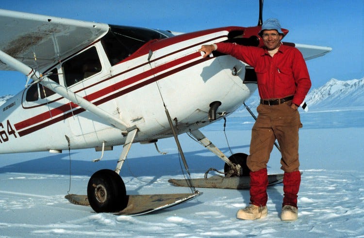 Francis Mauer with a single engine aircraft on skis by USFWS