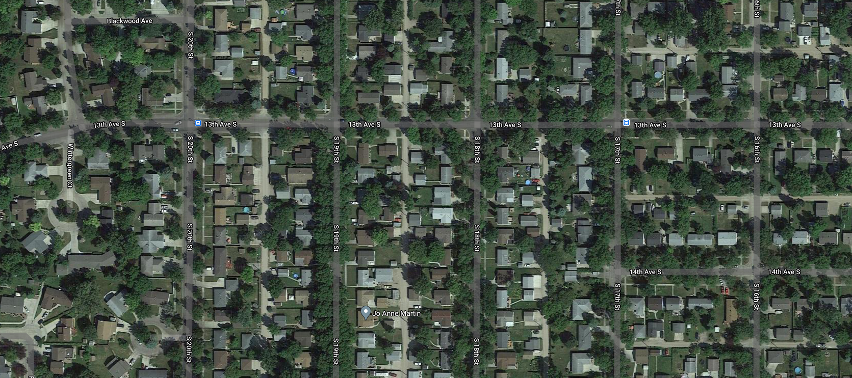The American suburb has a lot of green space but it is all private backyards. There are no public areas.