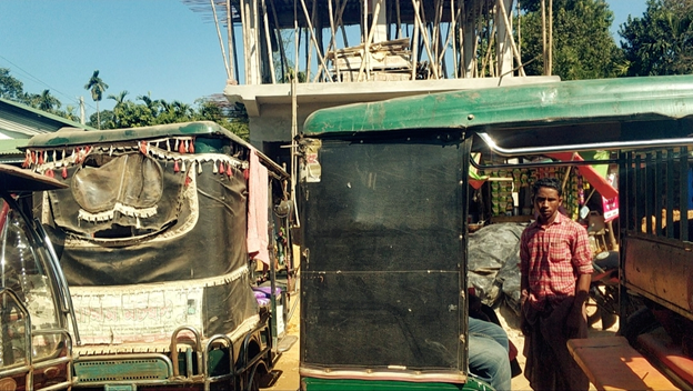 Green tuk tuks in the morning traffic towards rohingya kutupalong refugee camps