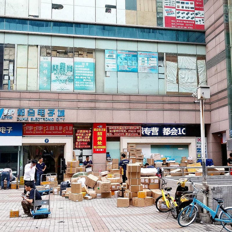 Main business hours are from noon to maybe 4 in the afternoon, then the whole city switches to fulfillment mode. Then, all back alleys are visually dominated by cardboard boxes and ubiquitous yellow packing tape. Image: Peter Bihr (CC by-nc-sa)
