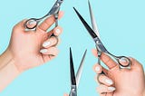 Two hands with a pair of scissors, and one pair on a blue background