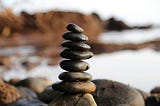 balancing stones in a pile
