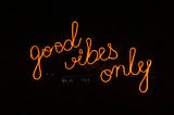Neon display saying “good vibes only”