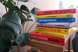 A collection of books related to product management and design.