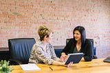 Two females talking