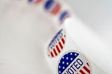 A string of “I voted” stickers