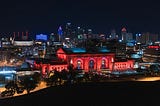 Kansas City Union Station at night lit in red lights