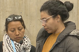Screenshot from the City Council’s hearing on the BPS budget. It shows Glennys Moya reading Sonia Medina’s statement to the City Council in Spanish. Erika Pérez translated the statement into English.