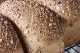 Fresh baked whole wheat loaves of bread.