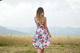 Blonde girl in flowered dress
