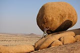 A fun shot of my husband 'holding up' this rock in Nambia on holiday in 2010. A love the warm glow of the late afternoon light. 