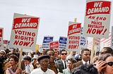 people demonstrating for voting rights