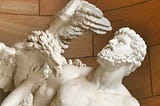 Marble Greek statue of man and eagle.