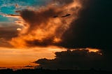 A photo of clouds at sunset