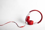 A set of bright red headphones to indicate a warning.