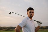 Rich man playing golf