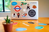 Laptop with stickers on it