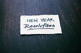 New year resolutions written on a paper