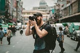 Photographer in the street taking a photo