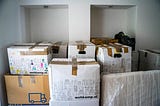 Stacks of taped up boxes