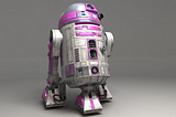 Photo of R2-KT, an R2-D2 unit with pink instead of blue highlights