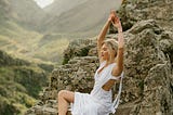 A woman practicing mystical thought outdoors