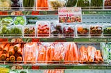 A section in the grocery where frozen fruits and vegetables are stored.