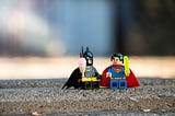 Superhero team collaborating with Dependency Injection for JavaScript development
