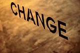 The word CHANGE written from the upper left side of the picture towards the lower right side represents a negative trend that must be changed