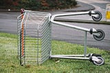 A picture of a metal cart turned on its side.