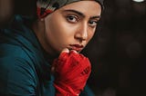 Woman with hands wrapped for boxing