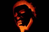 A pumpkin carved with the face of Michael Myers.