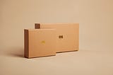 Cover image from Unsplash that shows two cardboard boxes