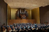 A wide shot of UC Berkeley’s Symphony Orchestra performing on stage.