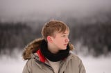 Young Swedish man in snowy landscape…