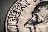 Part of a Franklin D. Roosevelt dime is seen, in a zoomed-in photo.