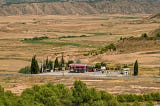 A photo of a gas station in the desert