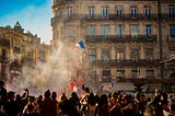 French citizens celebrating Bastille Day in the streets