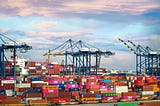 Stacked shipping containers.