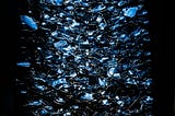 Shards of glass scattering, as if a mirror had exploded