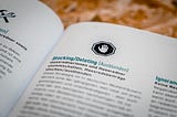 A book opened to a page on the topic of Blocking/Deleting