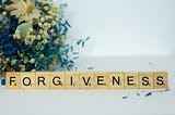 Forgiveness written using scrabble blocks
