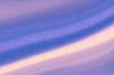 Abstract photo of a cool-coloured palette of a half-dozen softly waving lines, ranging from light pink to medium blue, angled gently from the bottom left to top right corner, slightly blurring into each other.