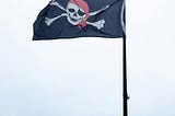 Jolly Roger flag flying in Swanage harbour